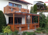 Alu-Liba Modell Germering mit Terrassenueberdachung im Holzdekor